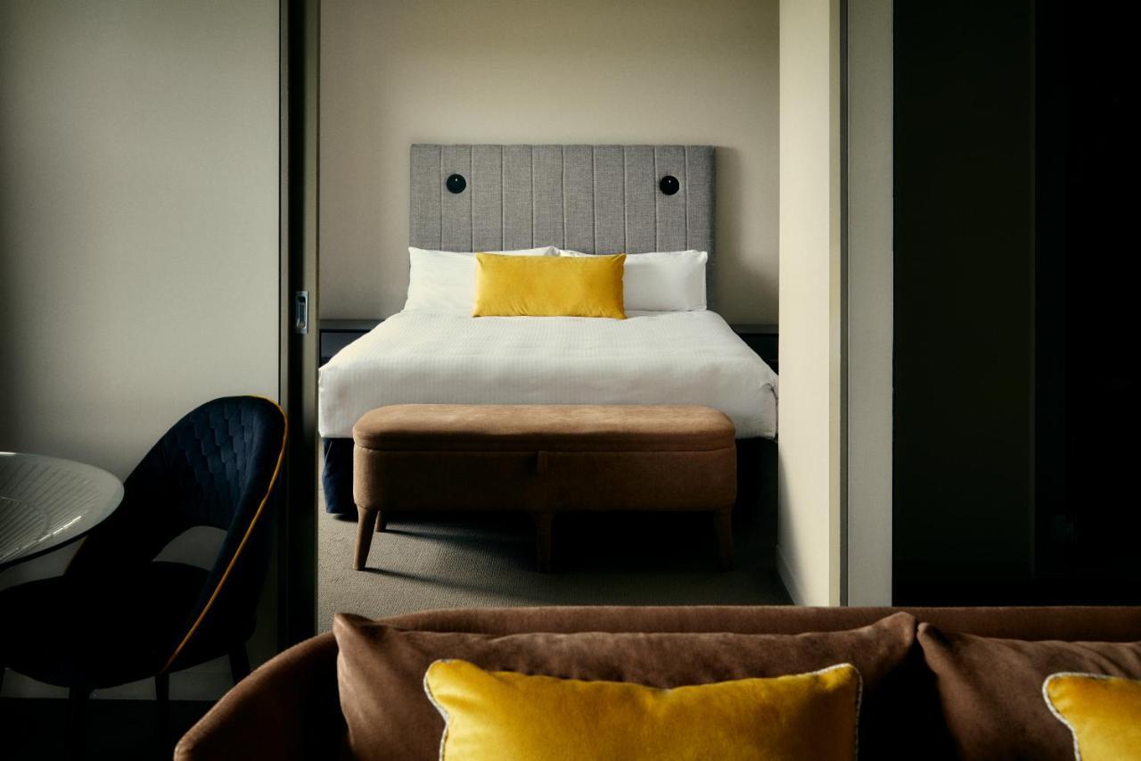 The Kinson Hotell Melbourne Eksteriør bilde A bedroom at the hotel