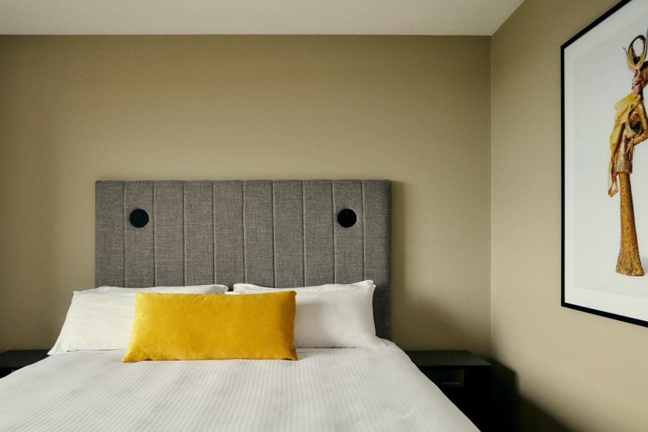 The Kinson Hotell Melbourne Eksteriør bilde A bedroom at the hotel