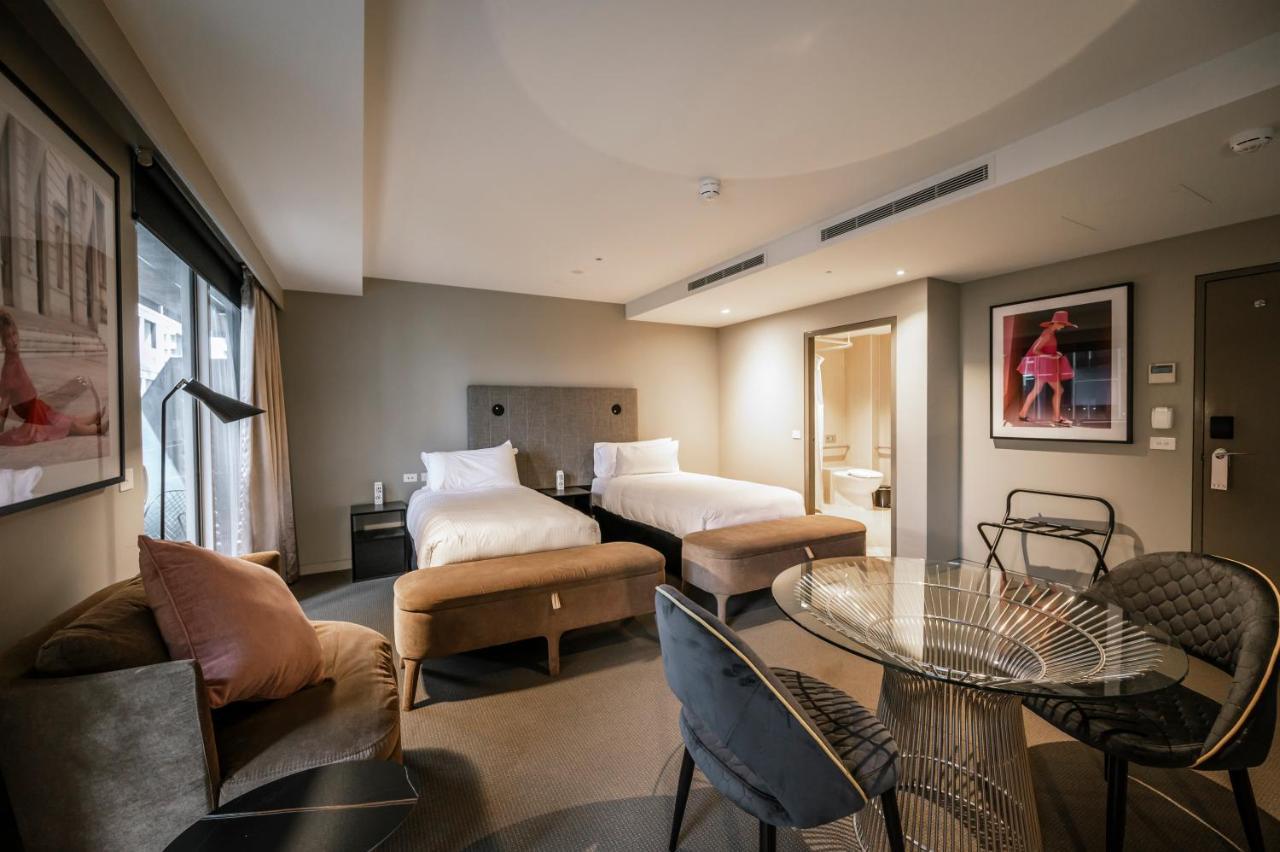 The Kinson Hotell Melbourne Eksteriør bilde A suite at the hotel